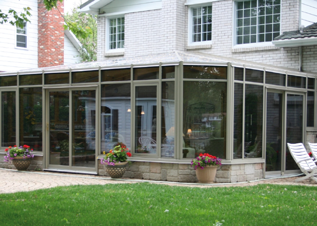 solarium sur mesure avec toit en verre